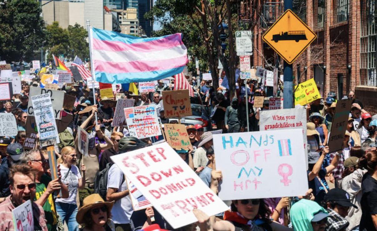  Thousands rally, march across county, protesting Trump actions on budget, immigration