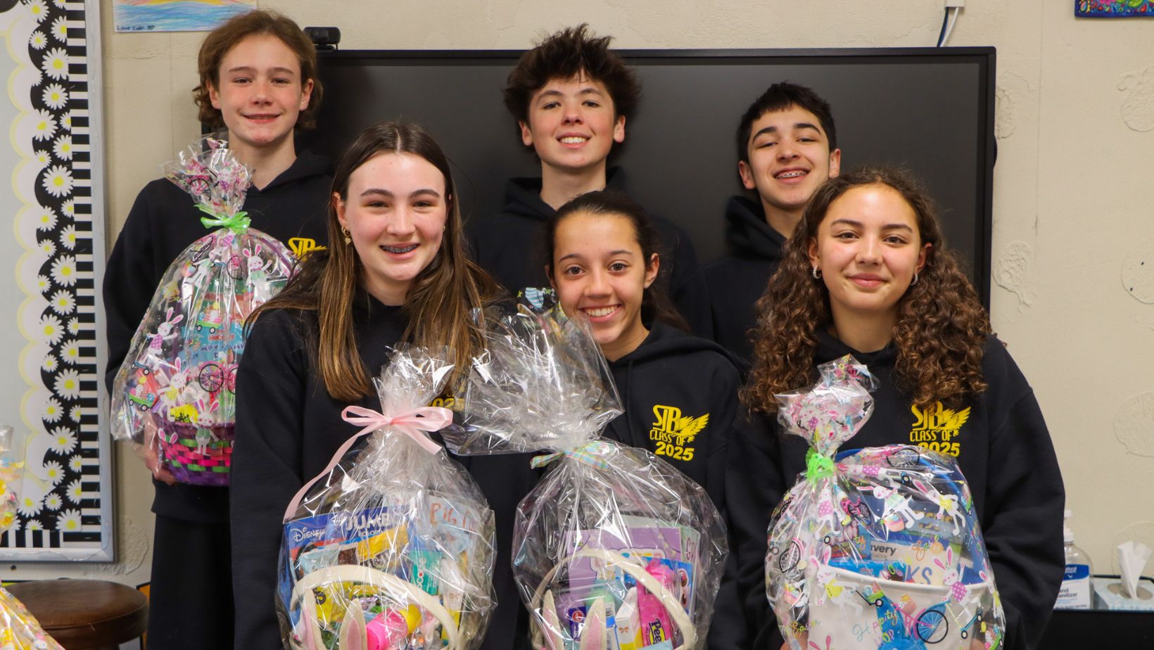 Students at Wilmington school prepare Easter baskets for children in need as part of annual project