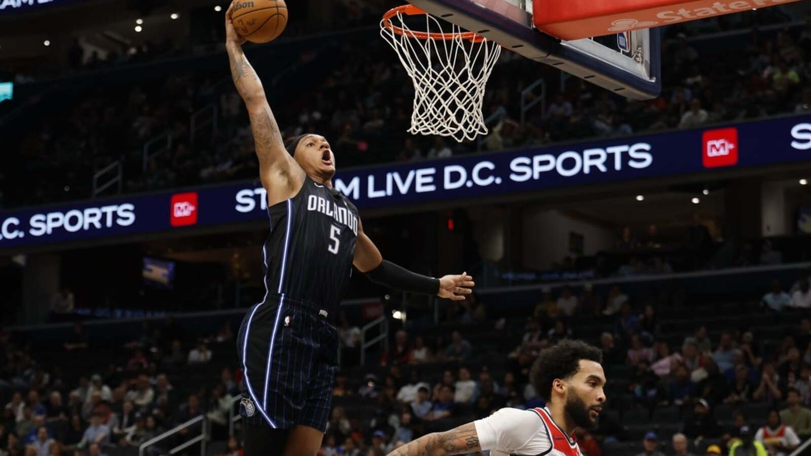 Magic, fighting for top play-in seed, host road-dominant Celtics