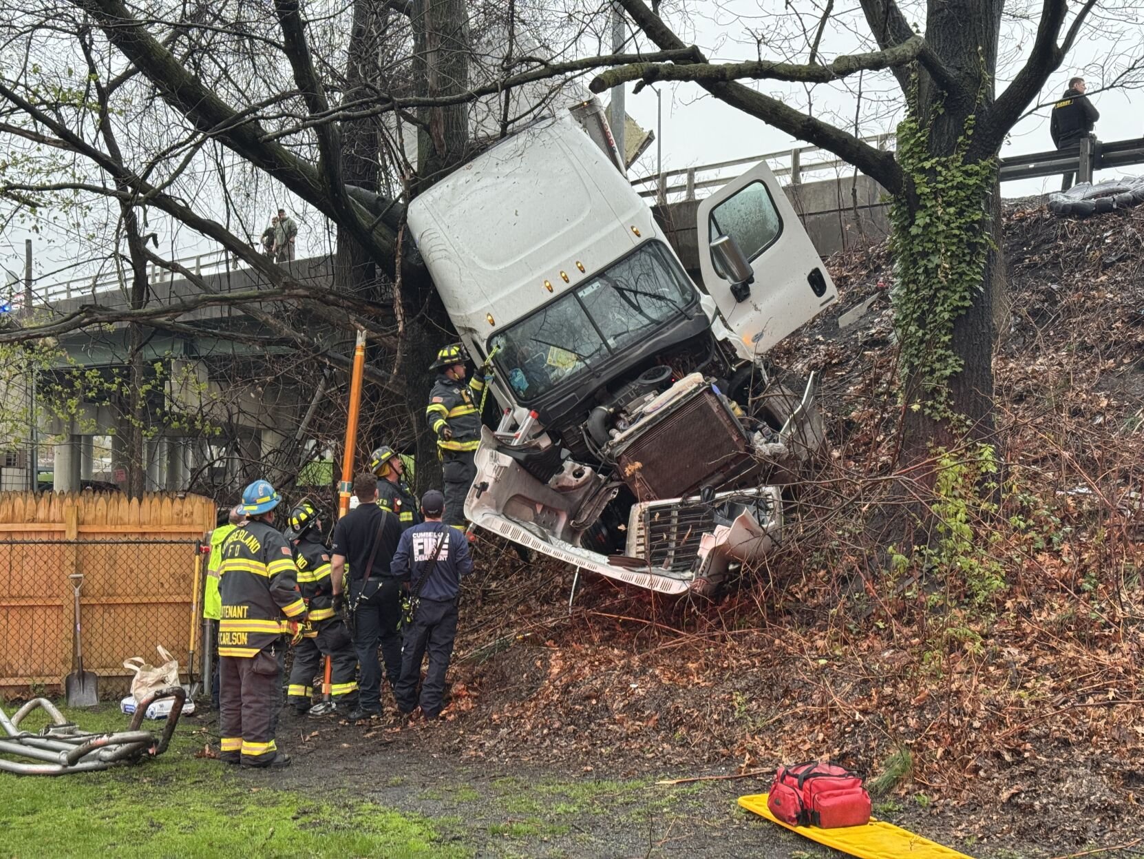 Truck travels off Crosstown Bridge, driver escapes serious injuries
