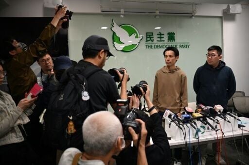  Members of Hong Kong’s Democratic Party approve plan to disband