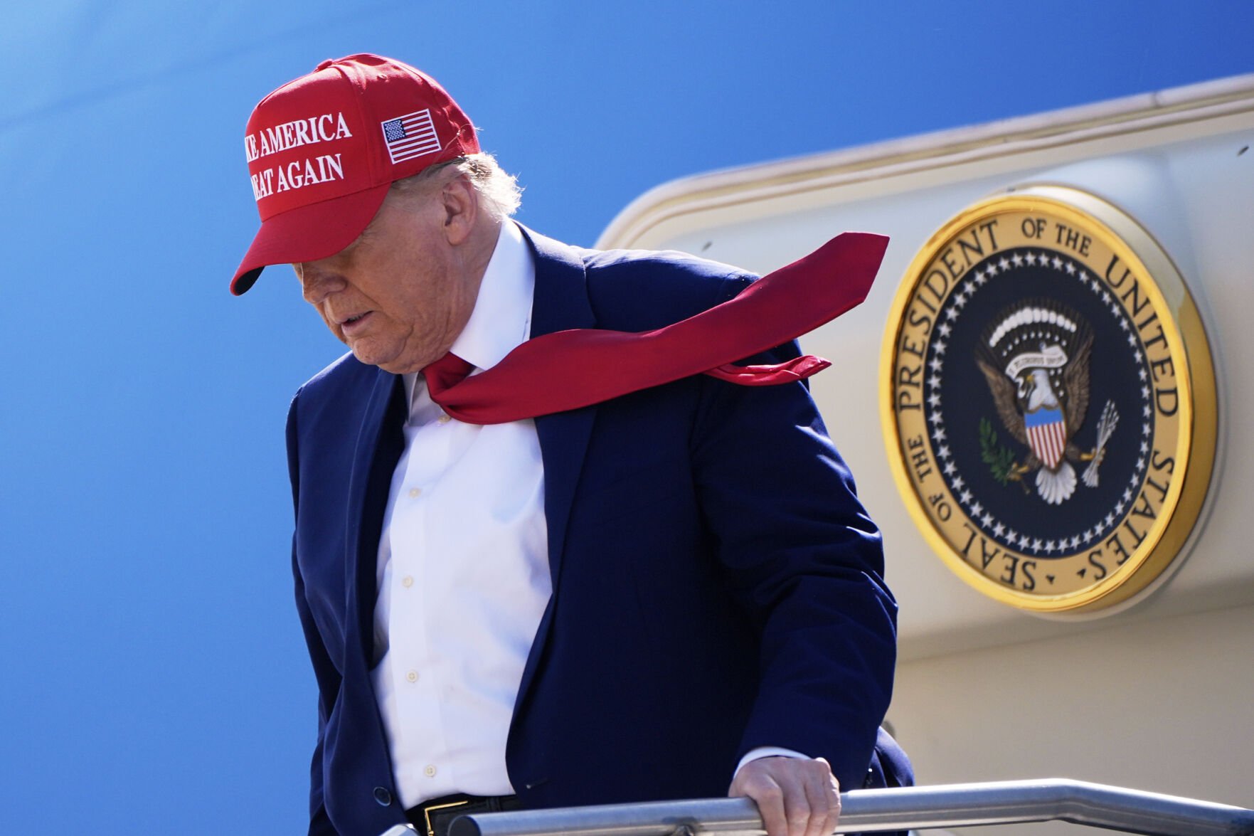  Trump greets Whitmer with a hug and gives her a win — new jets for Michigan airbase