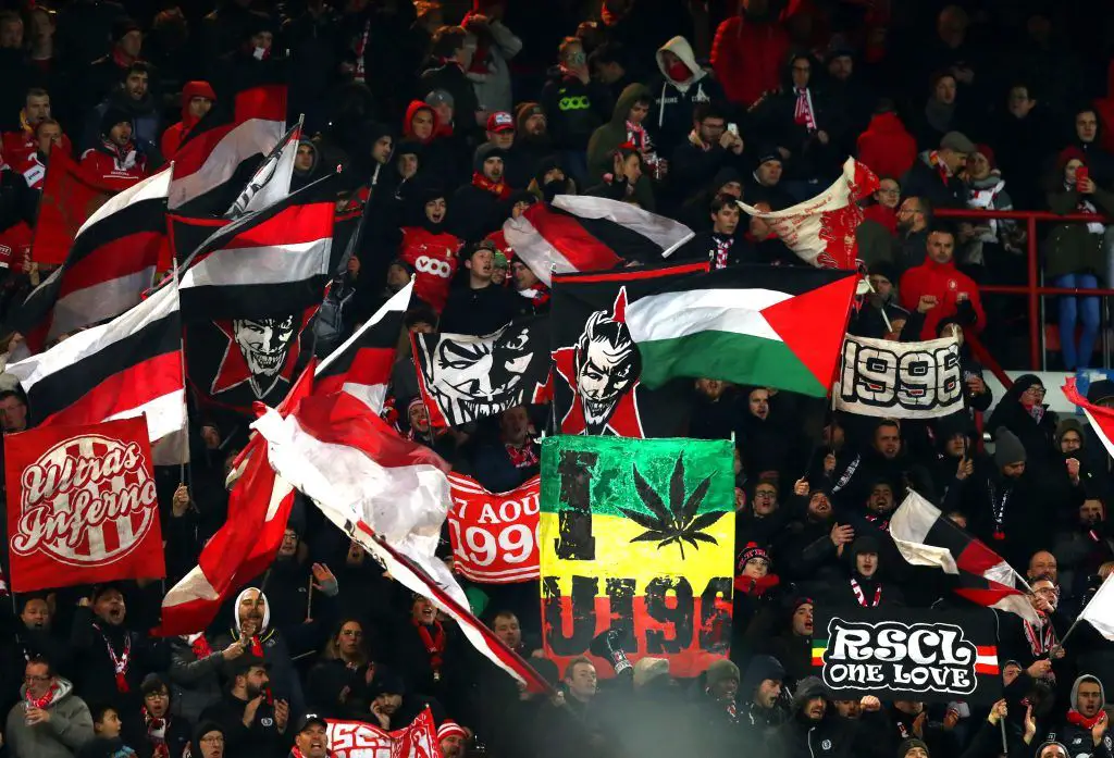 Charleroi under pressure after Standard Liege fans forced to evacuate stand following discovery of remote smoke bombs