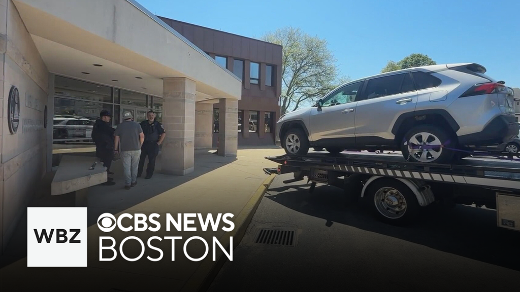 Woman accused of driving car into federal building in New Bedford