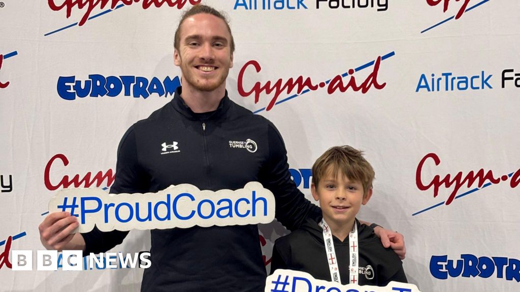  Robbie, 10, makes history with gymnastics medal