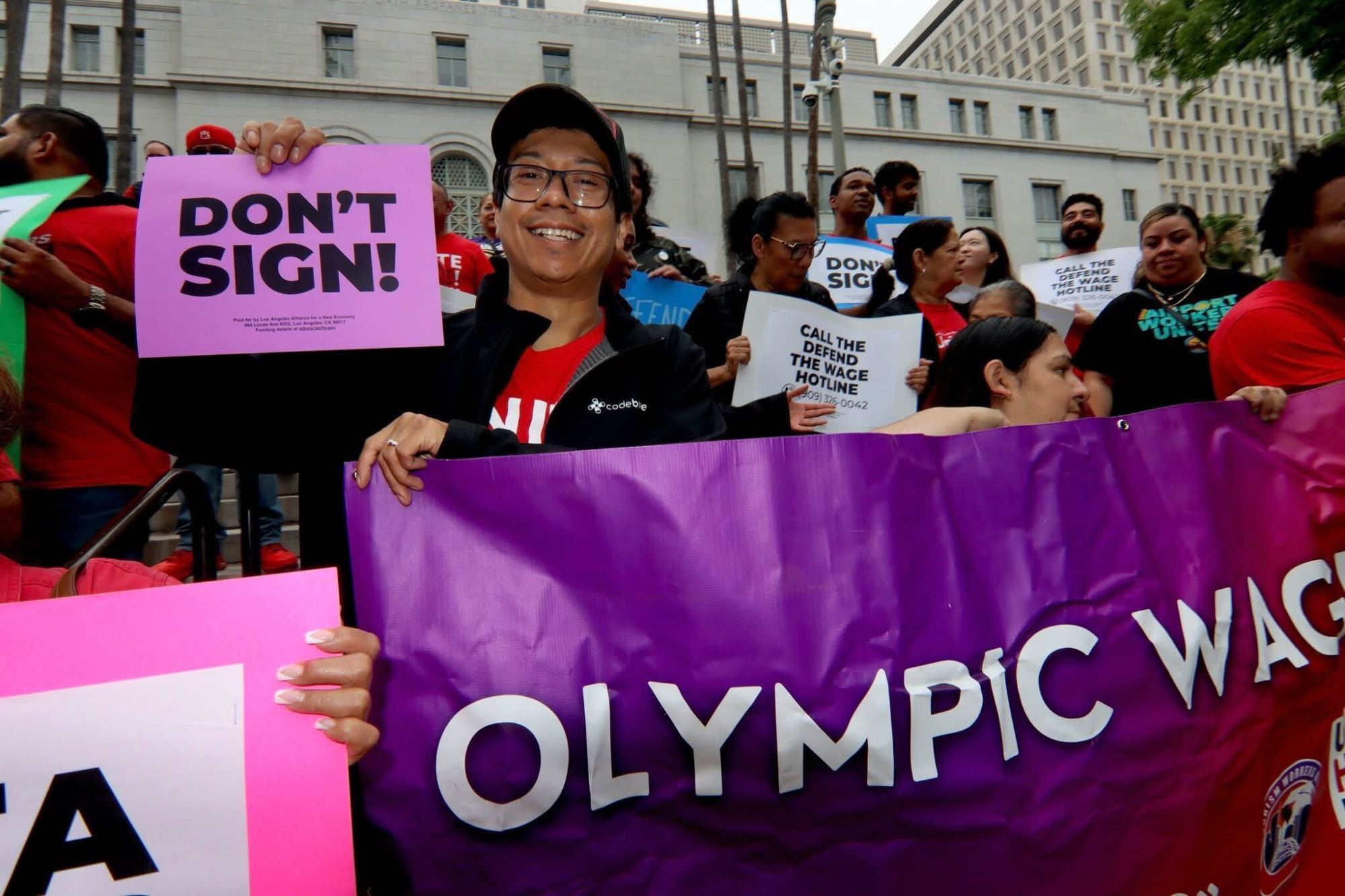  Thirty elected officials sign a letter opposing referendum on Olympic wage ordinance