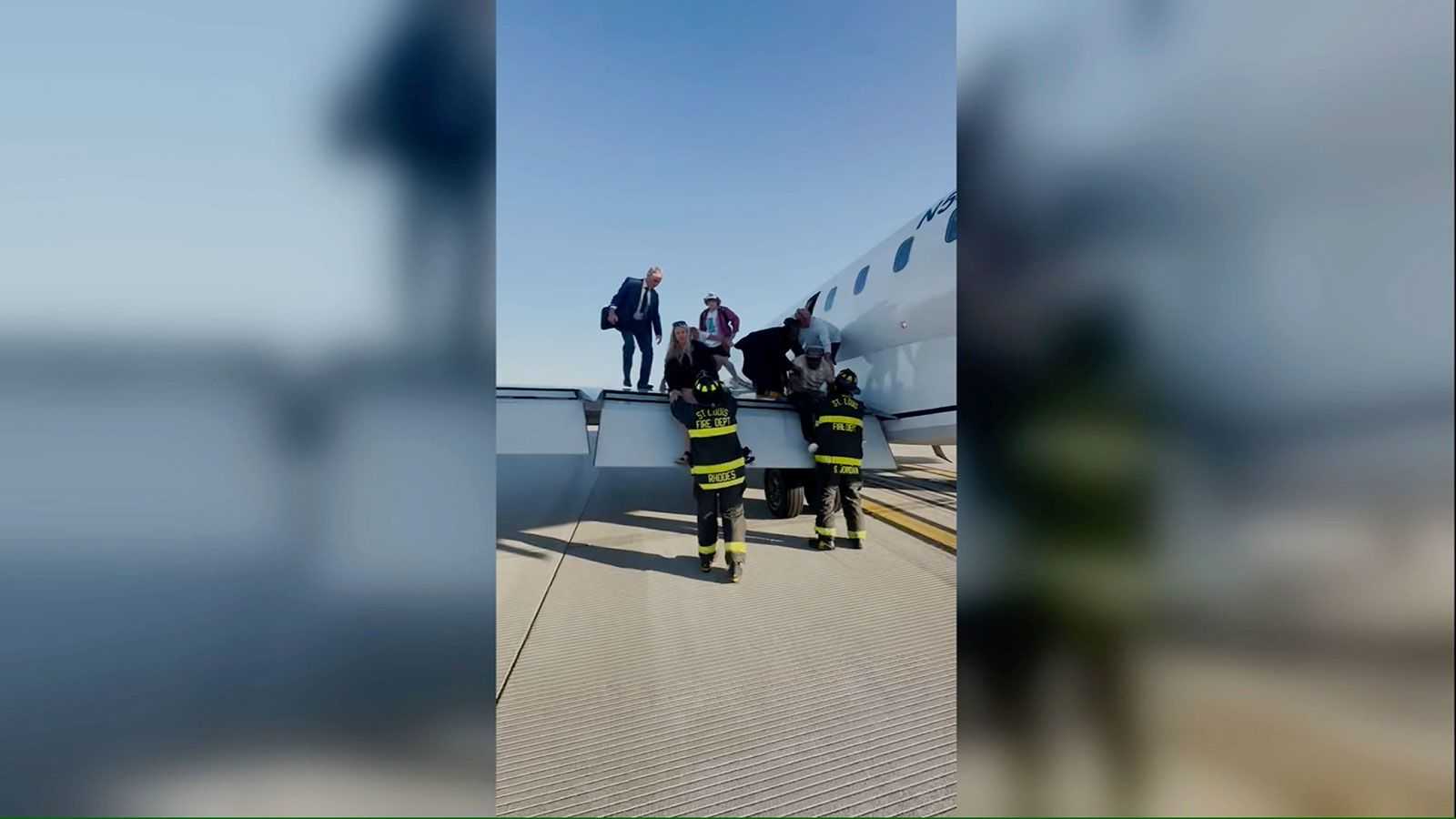 Passengers scramble out of plane in St. Louis after report of smoke in the cabin