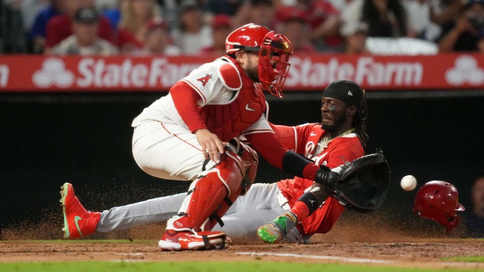 Reds score two in the ninth for their third straight win