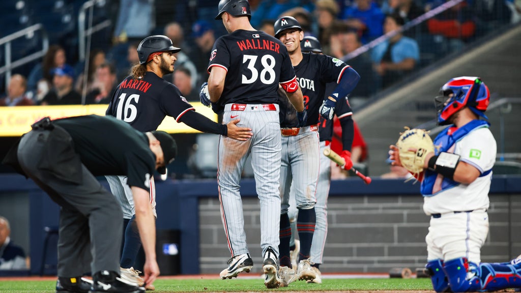 Twins rally to beat Blue Jays 7-5