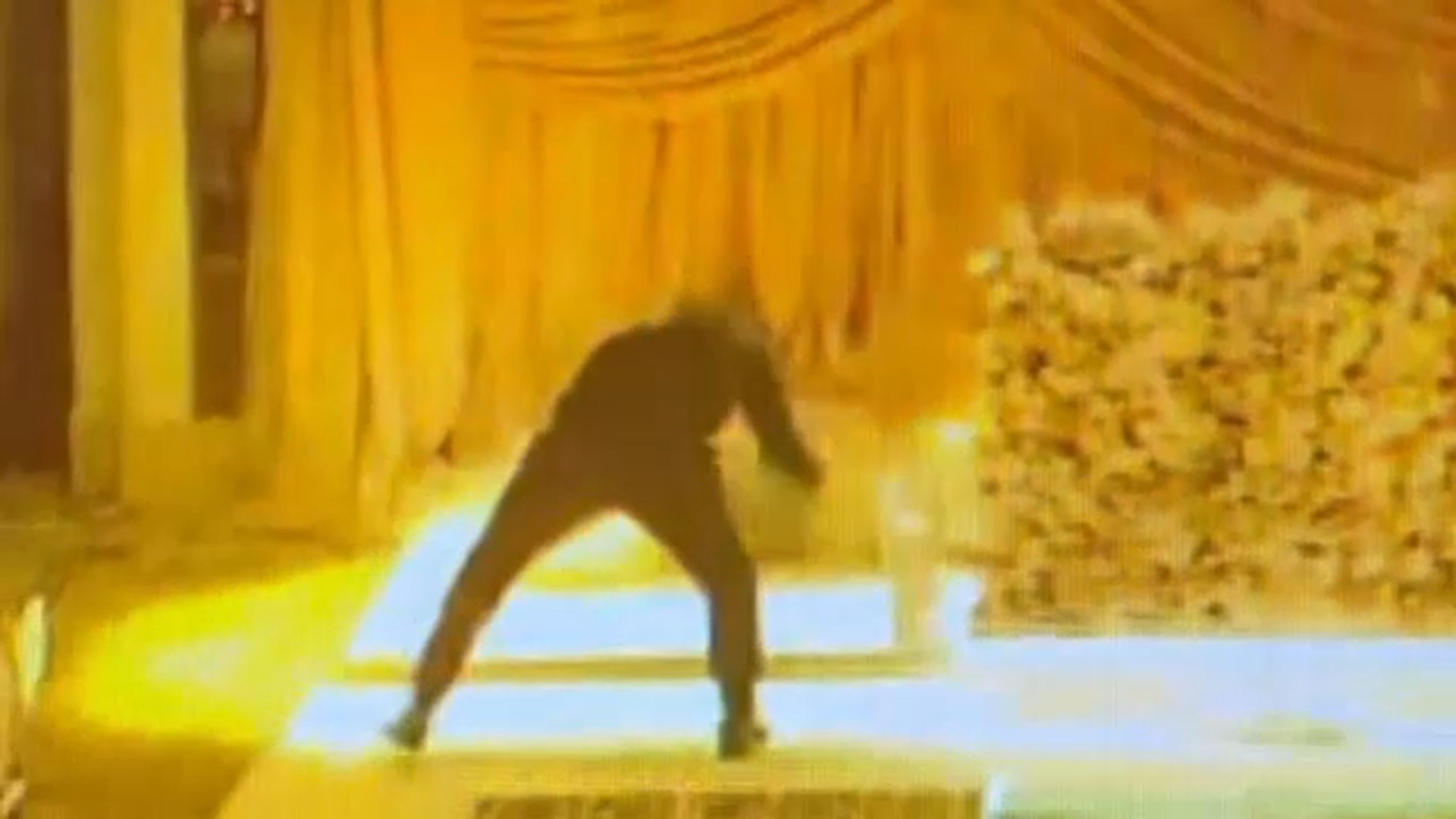 Brazen wedding crasher caught on camera stealing thousands of dollars in gifts from couple