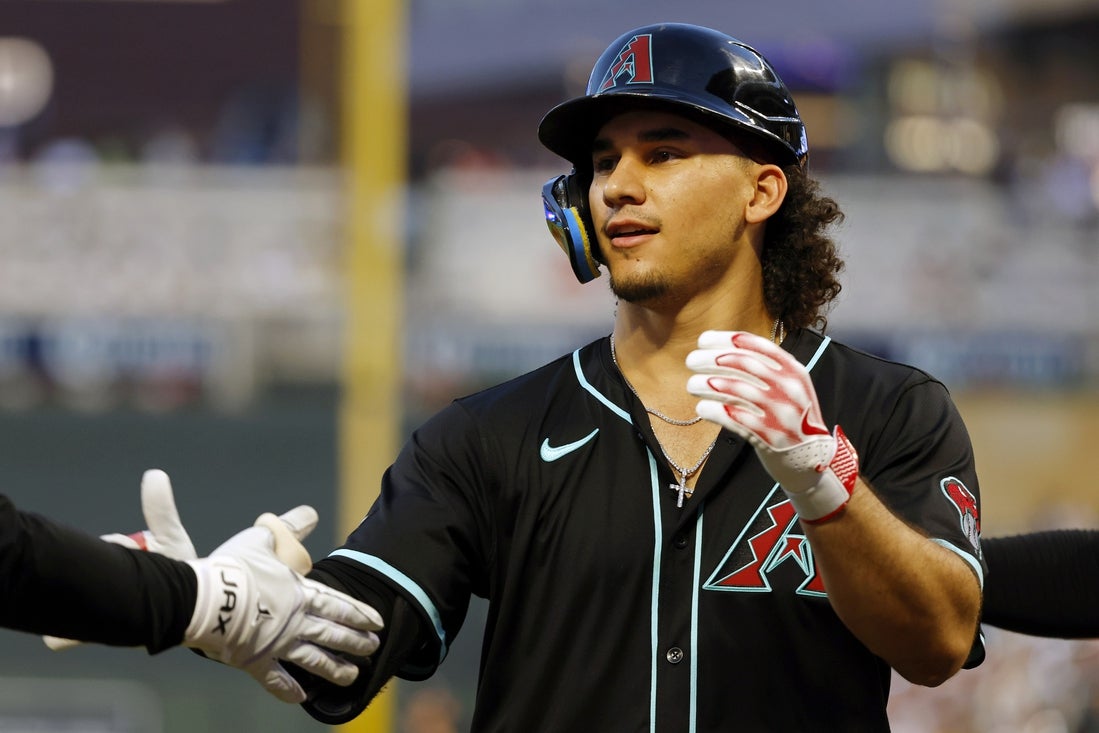 D-backs let late lead slip away, then top Twins in 10