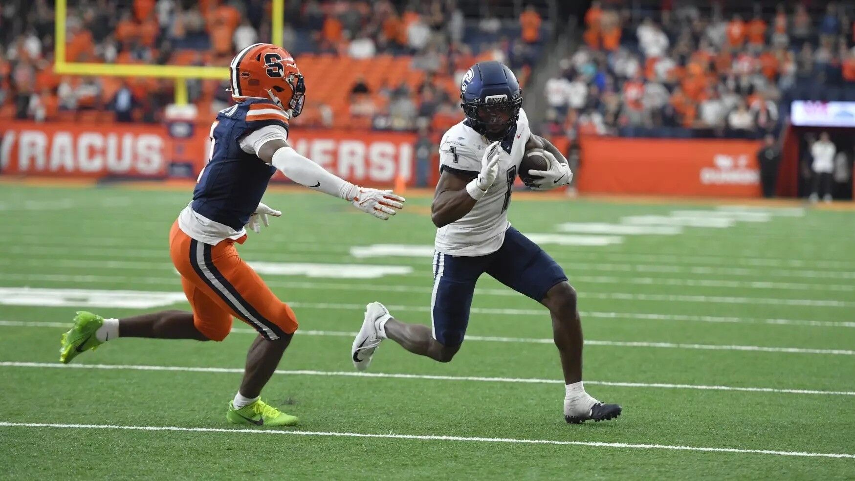 Huskies lose late lead, fall in overtime to Syracuse 27-20