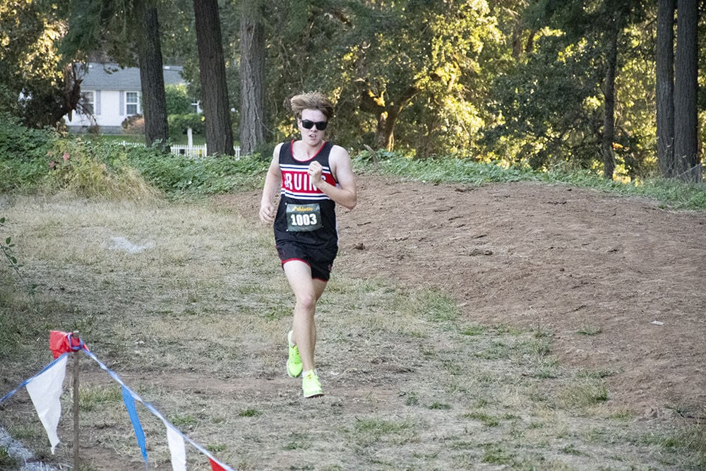 Columbia runners take care of business at home