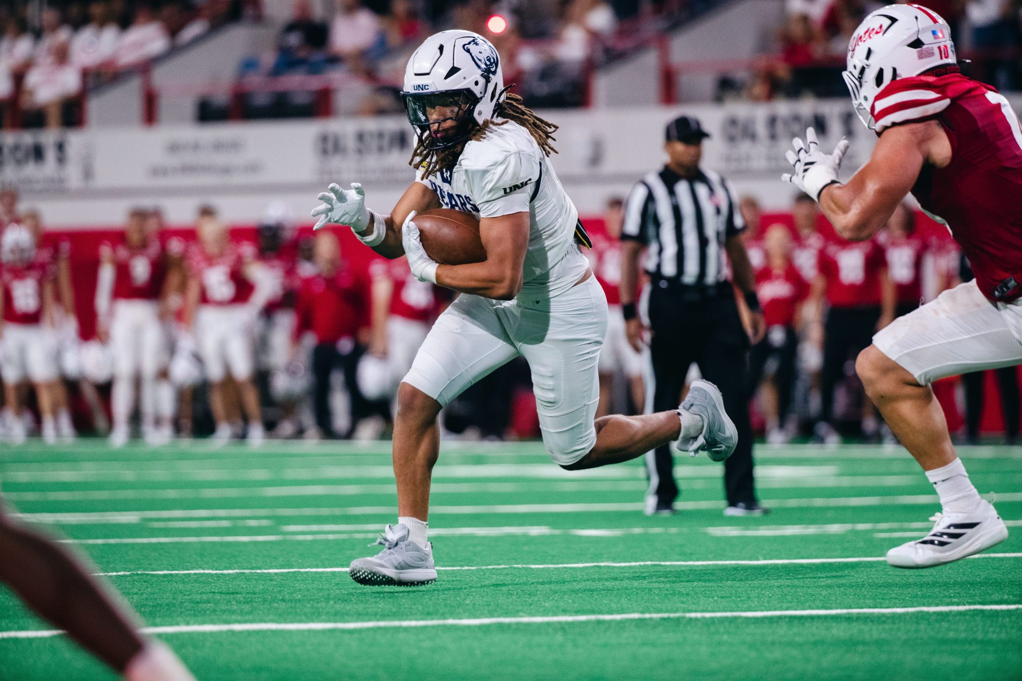 South Dakota football runs over UNC, but needs OT to beat the Bears 24-17