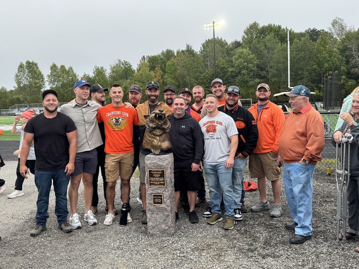 Gardiner football remembers the late John Wolfgram and Brad Carleton