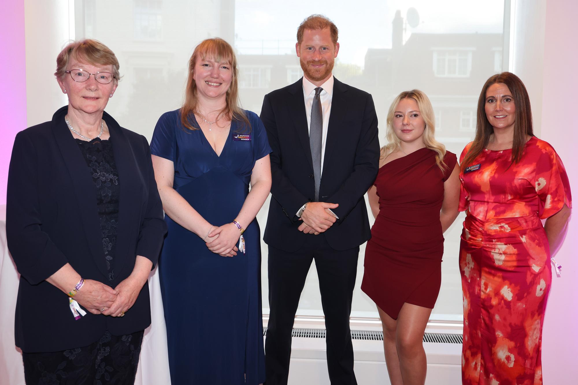 Prince Harry congratulates Brighouse nurse Helen Tooby at WellChild Awards
