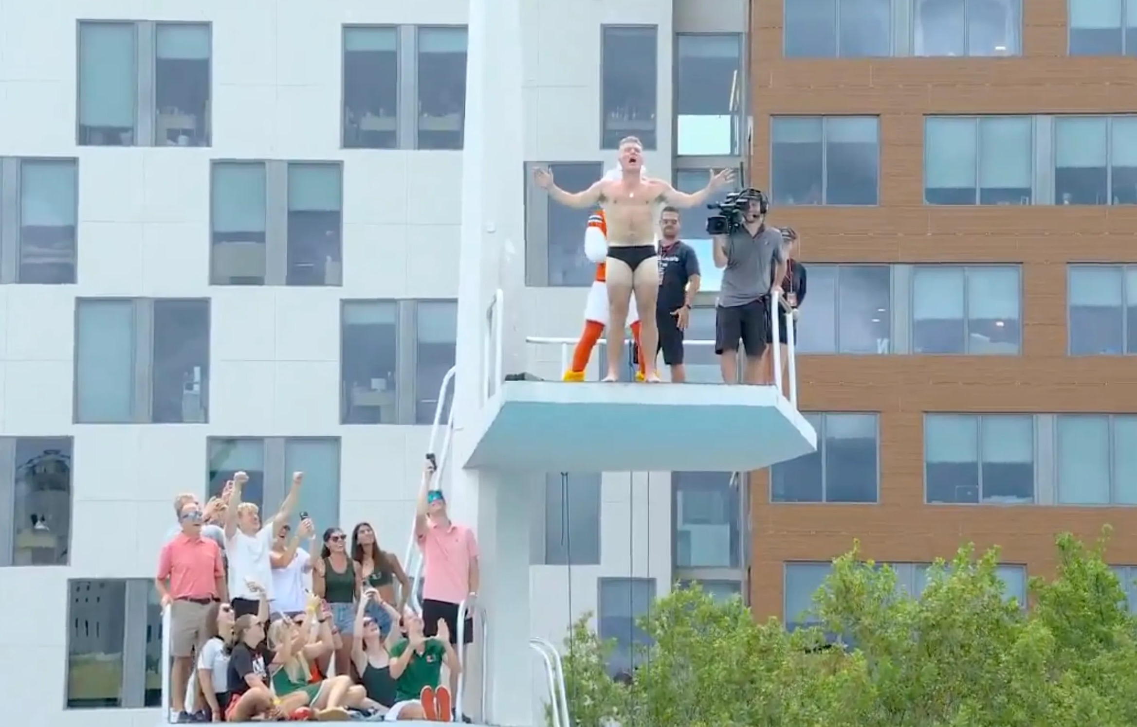 Pat McAfee jumps from high-dive in Speedo during stunning live TV moment after making final pick on College GameDay