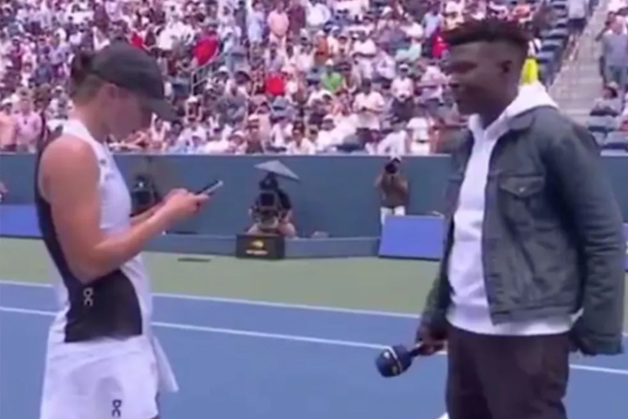  Iga Swiatek delays interview for important US Open text — here’s who she was messaging