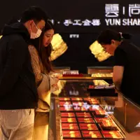  Gold slide continues, stocks keep calm