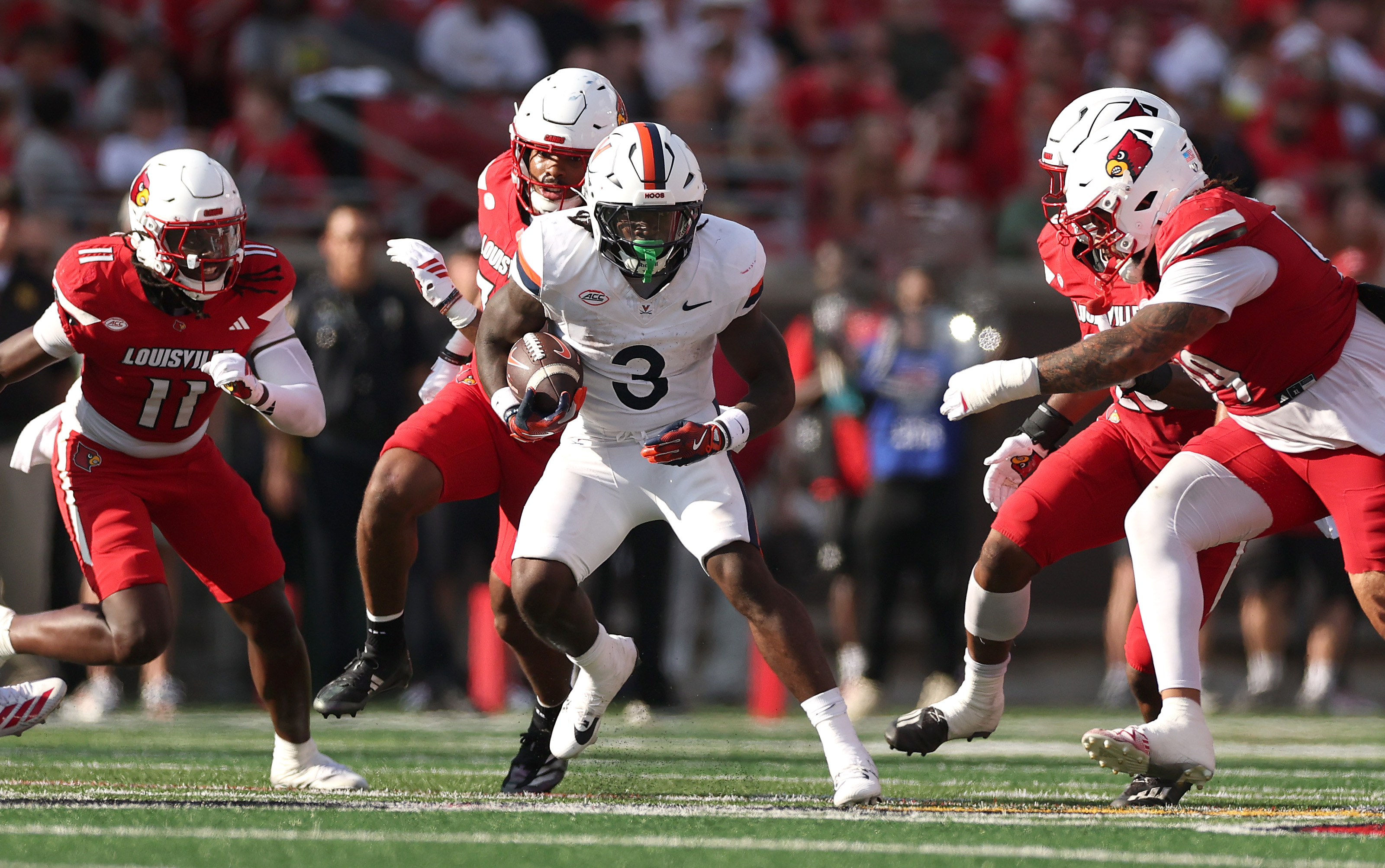 No. 24 UVA wins at Louisville in OT, goes to 3-0 in ACC