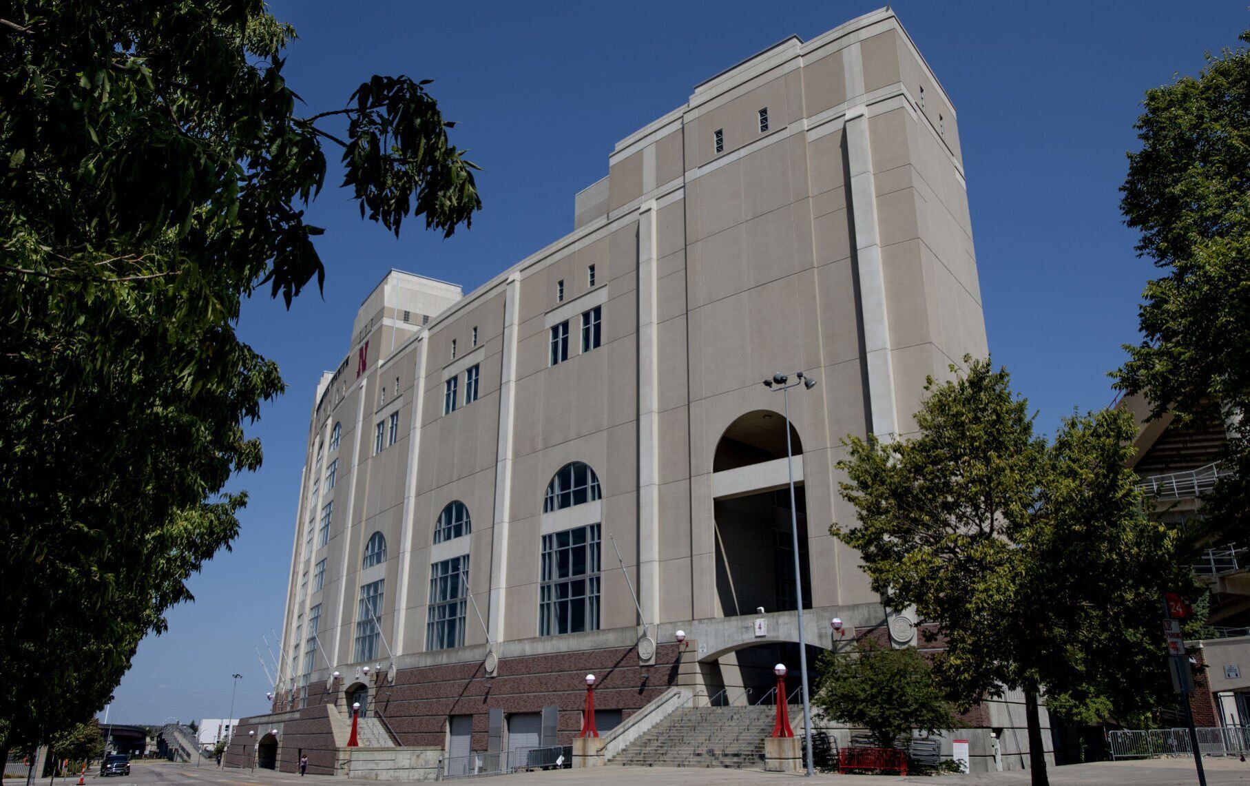 Memorial Stadium caper: 3 accused of using tree branch to sneak in, steal flag, beer, candy