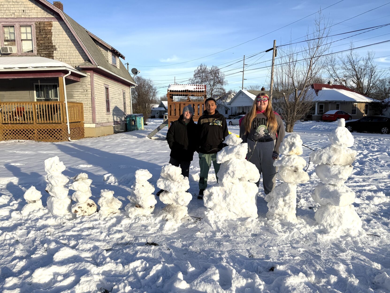 Snowmen represented Defiance neighborhood kids