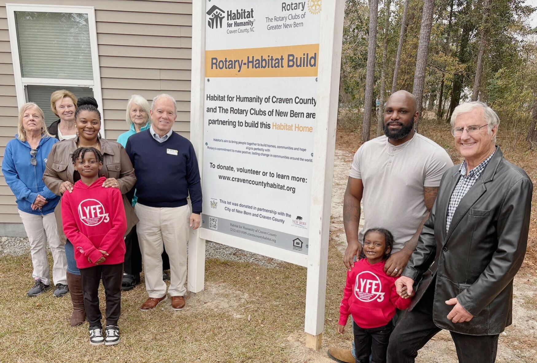 Families move into Habitat homes at Christmas