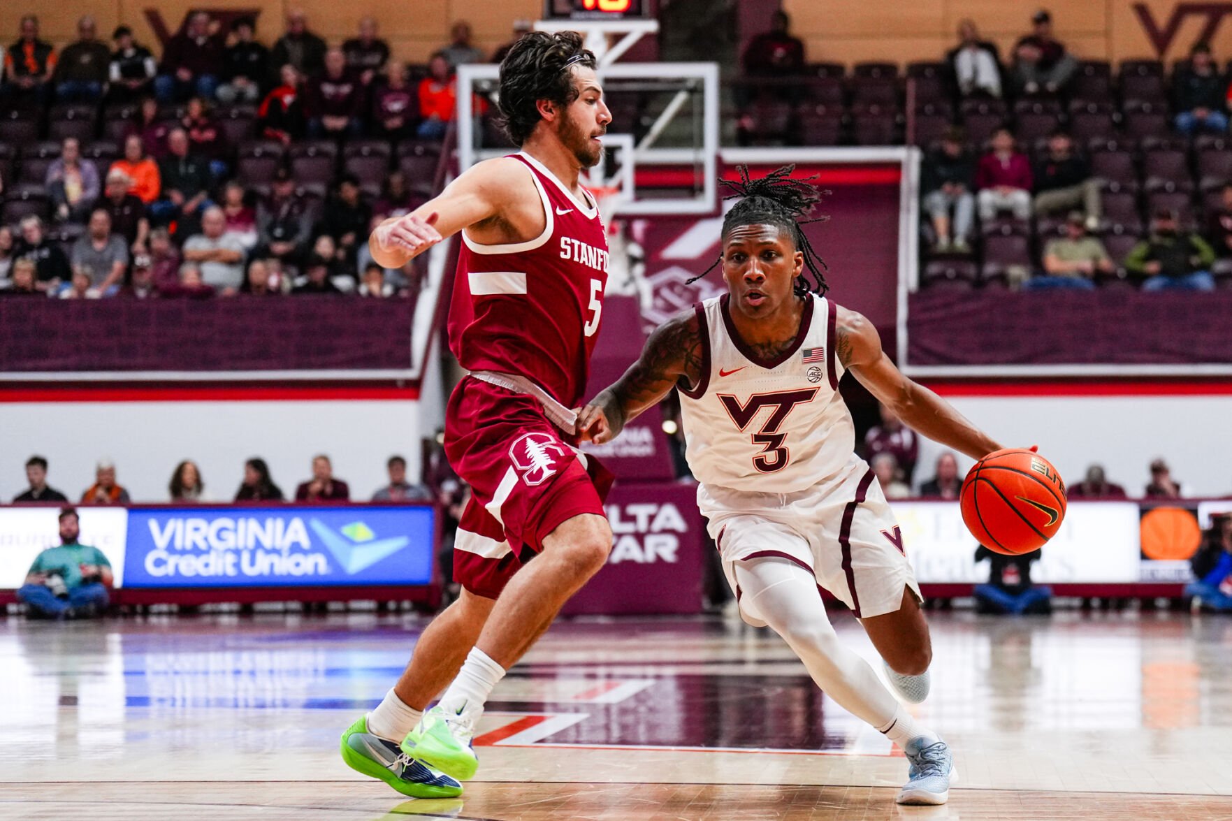 Lawal returns but Stanford rallies past Virginia Tech