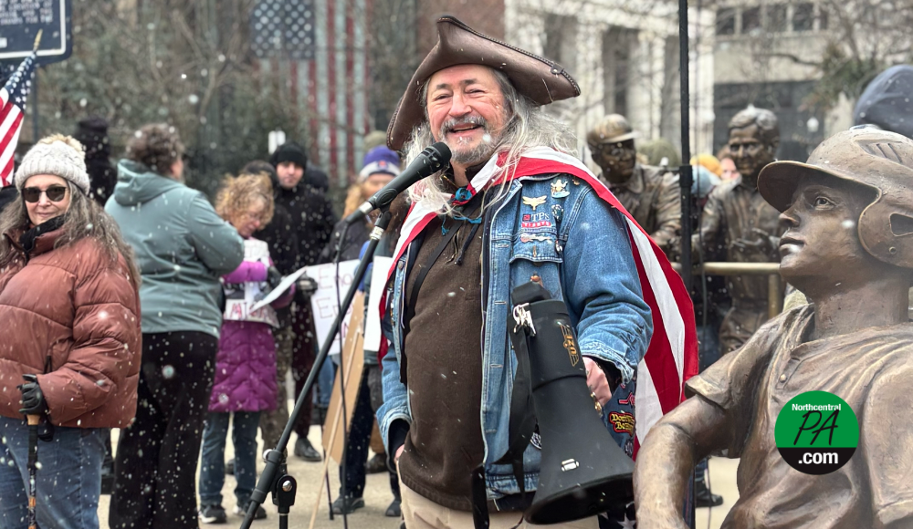 Williamsport shows up in snow to protest ICE