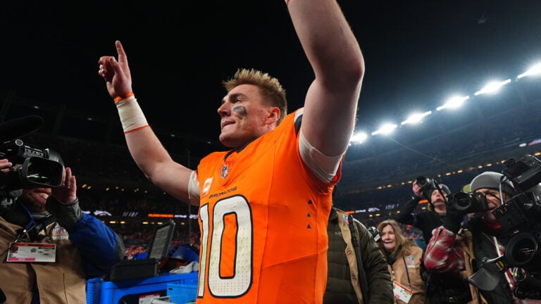 Bo Nix breaks his right ankle late in Broncos’ playoff win, will have surgery
