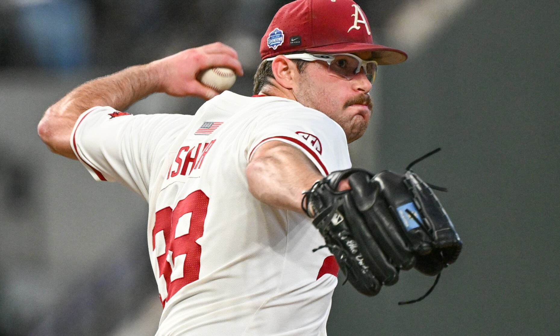 Hogs win in 11 over Texas Tech