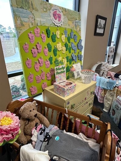 Sacred Heart Ladies Guild collecting items for Dresser Project