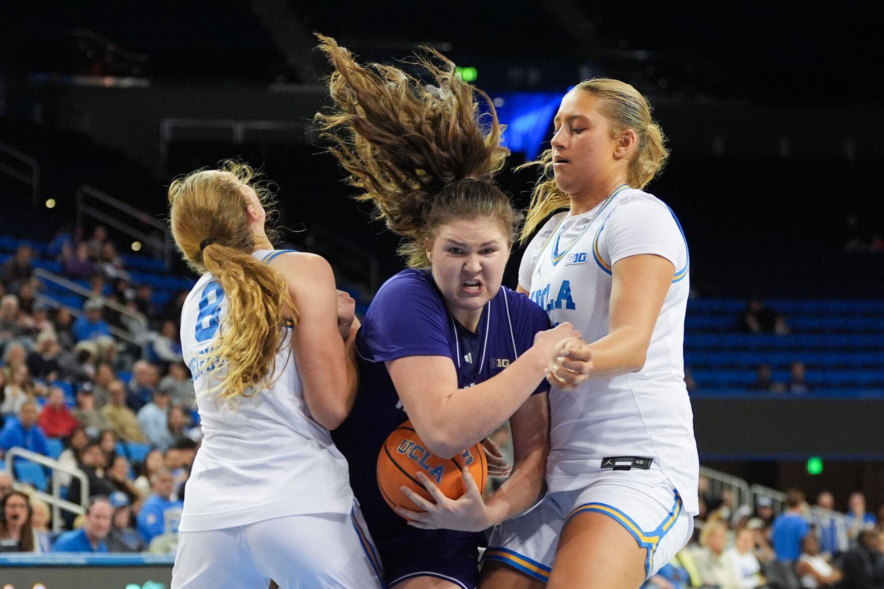 Betts powers No. 2 UCLA past Washington 82-67 to clinch a share of the Big Ten title