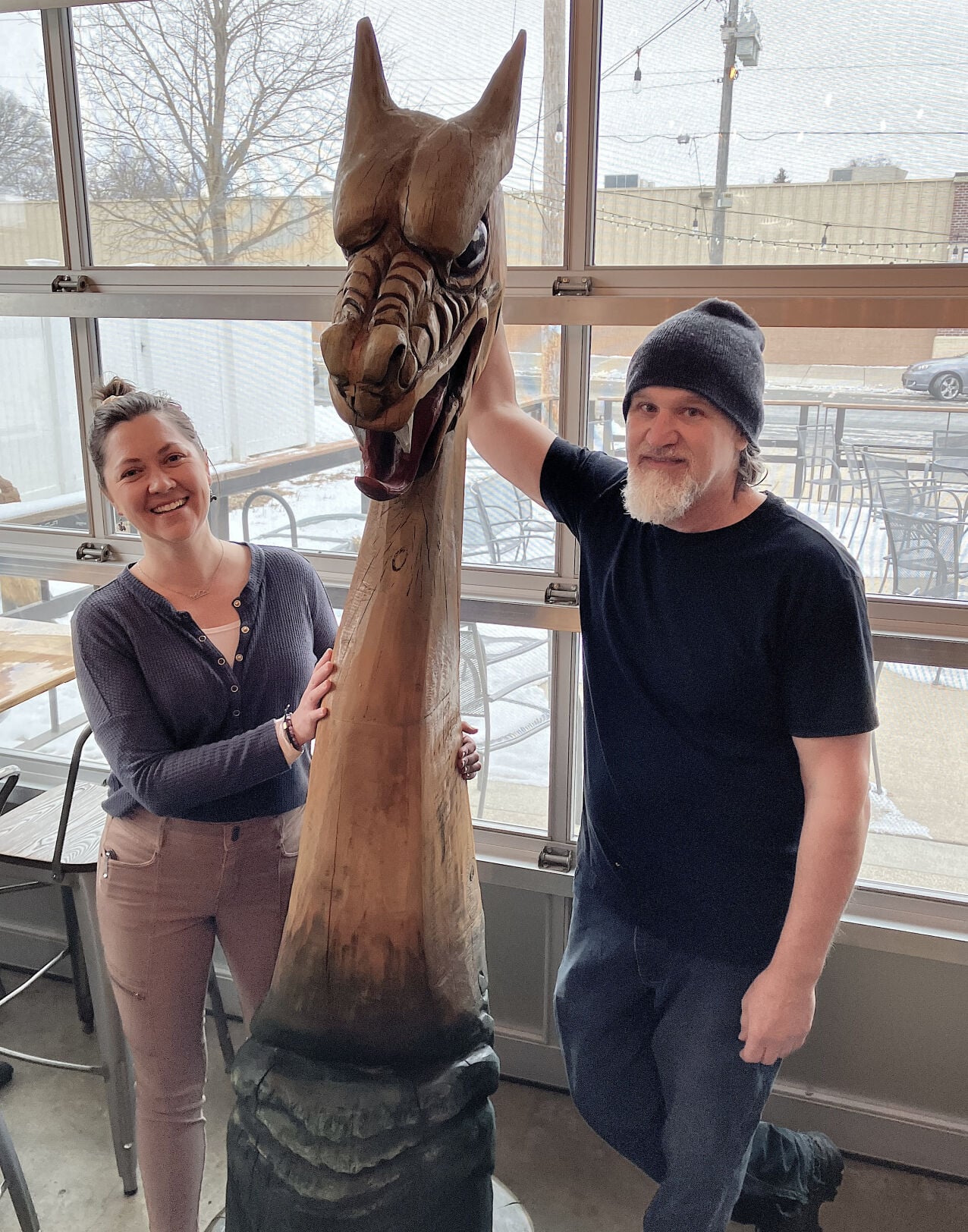 PHOTOS: Dragon sculpture returns to Imminent Brewing following restoration work