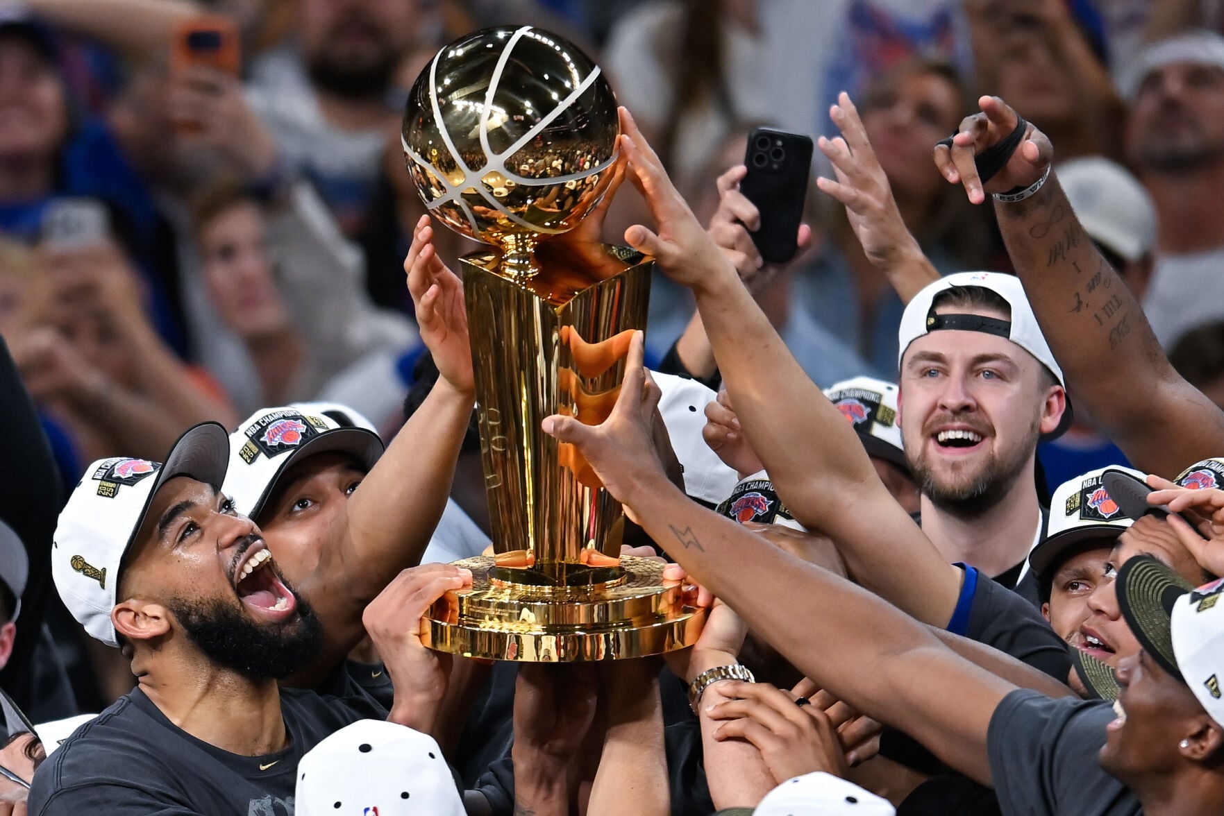 New York Knicks revel in their NBA victory parade as joyous fans and celebs fill the streets