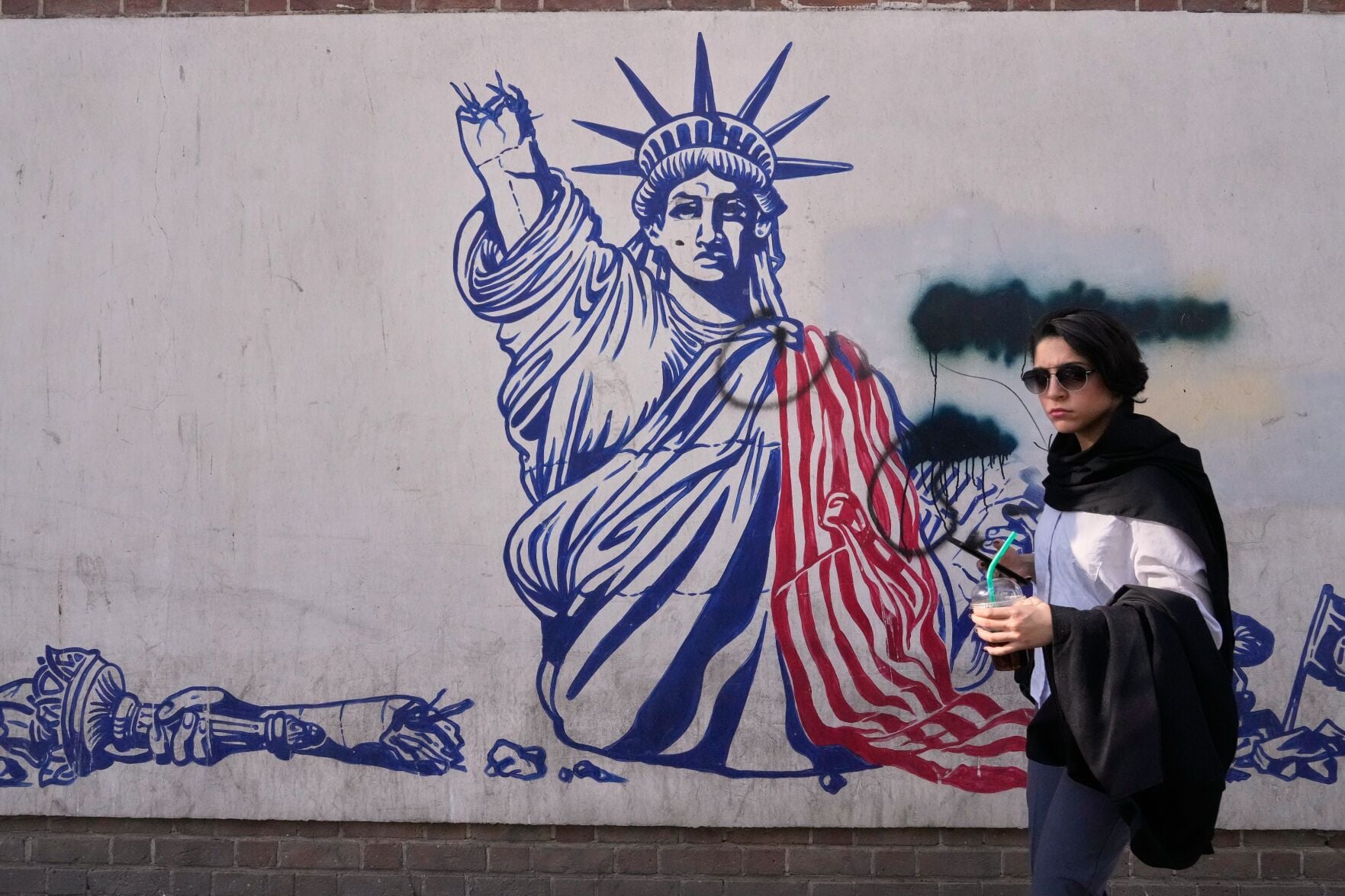 A history of Iran’s nuclear program and tensions with the US as an interim deal is signed