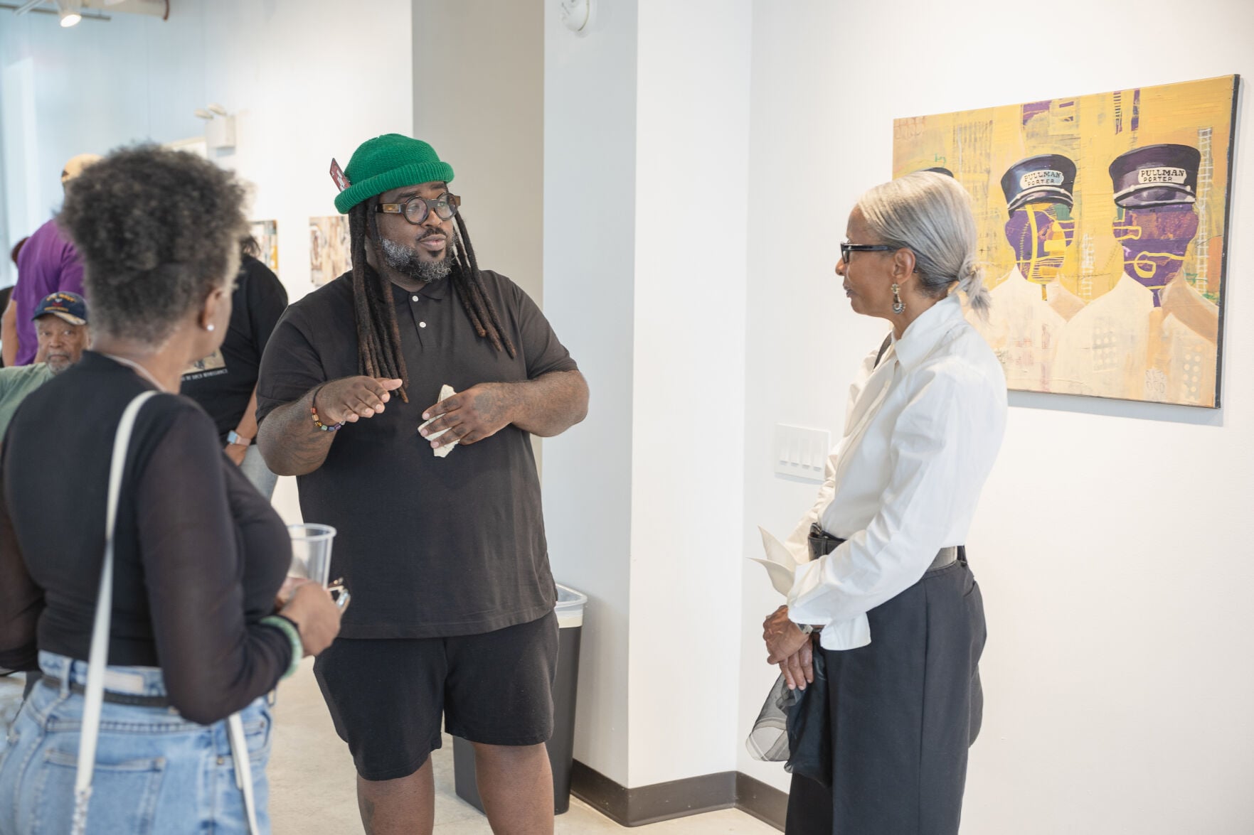 Exhibit of paintings features the legacies of the porters and maids who worked the railroads