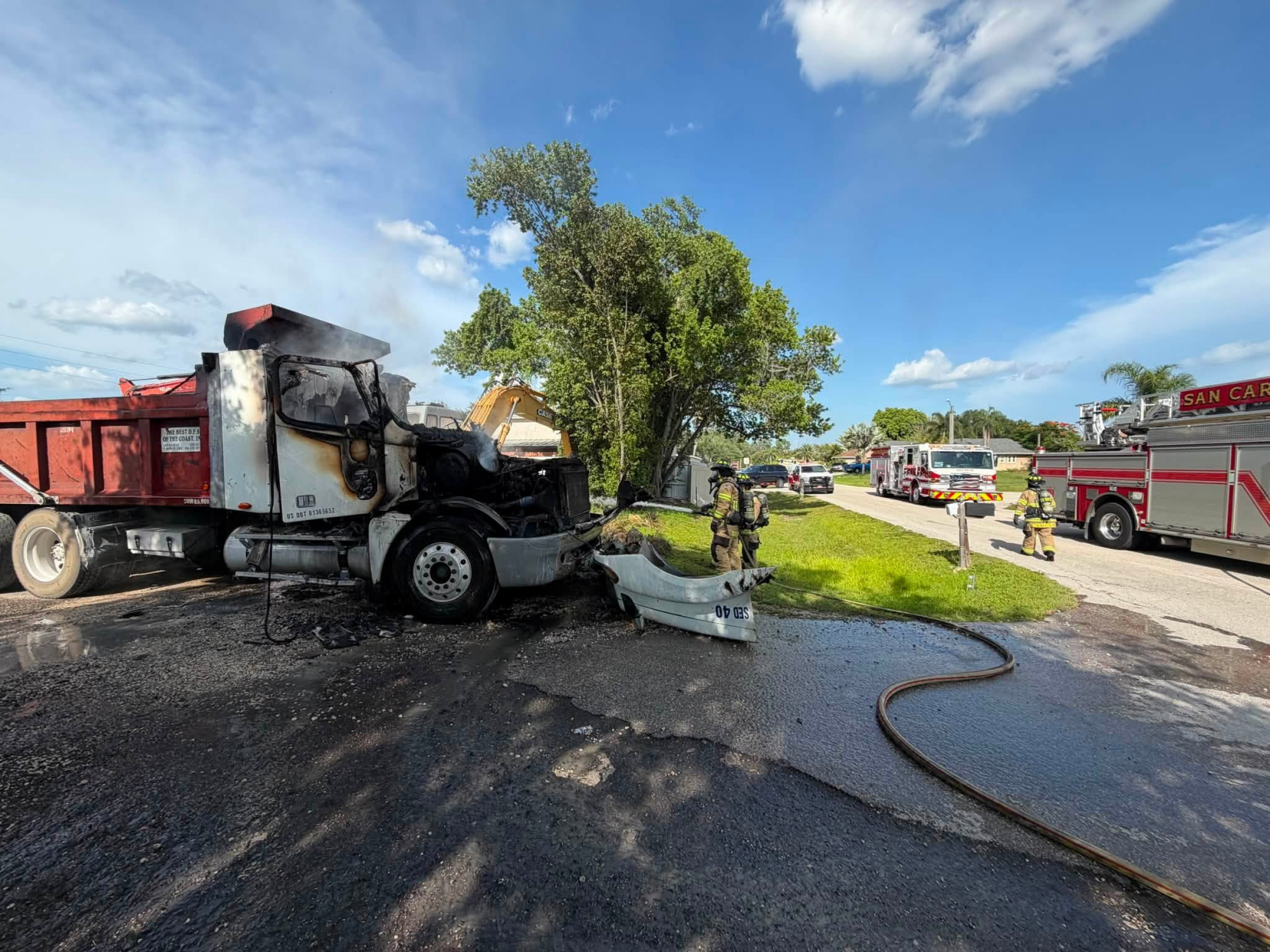 Dump truck catches fire on Aloha Road in San Carlos Park