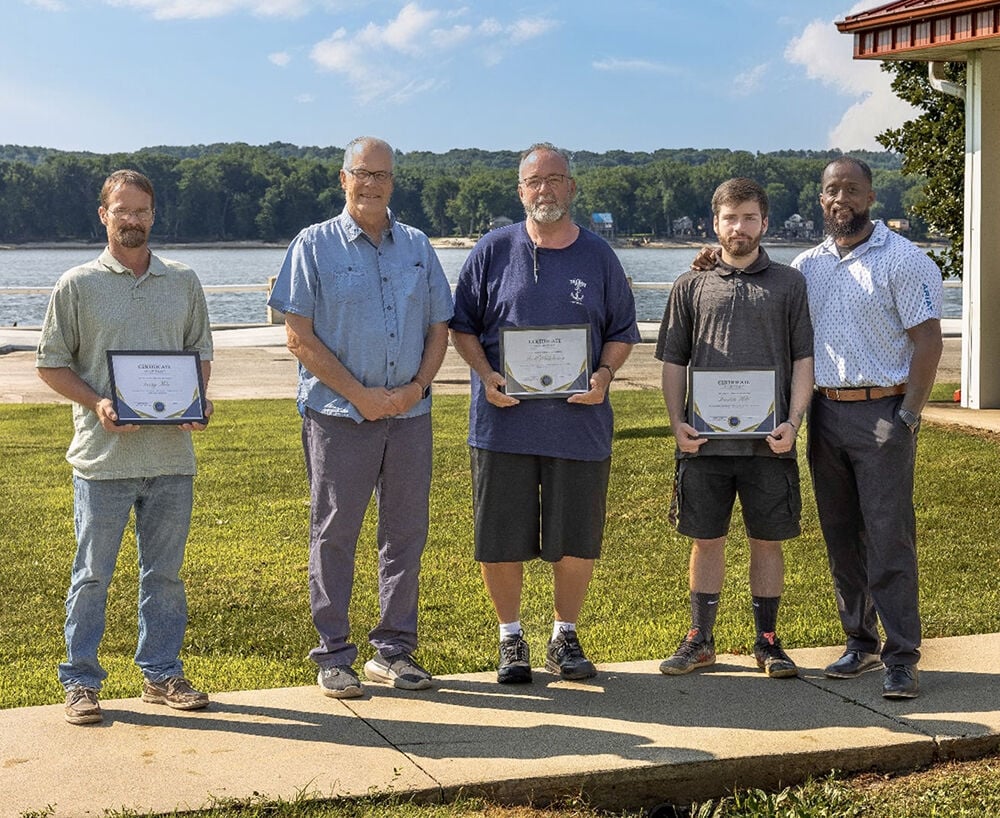 Three graduate from Talbot House program