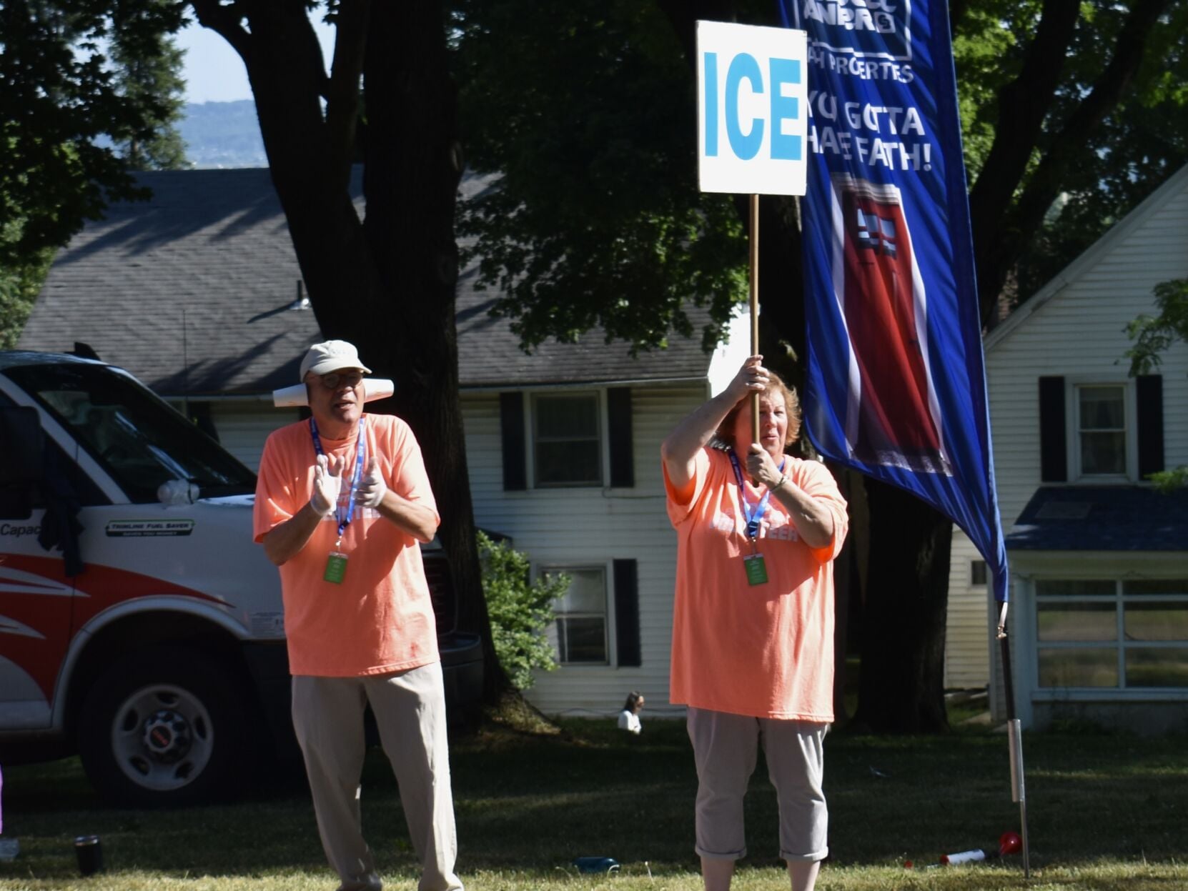 Water, cheers and smiles at mile 5
