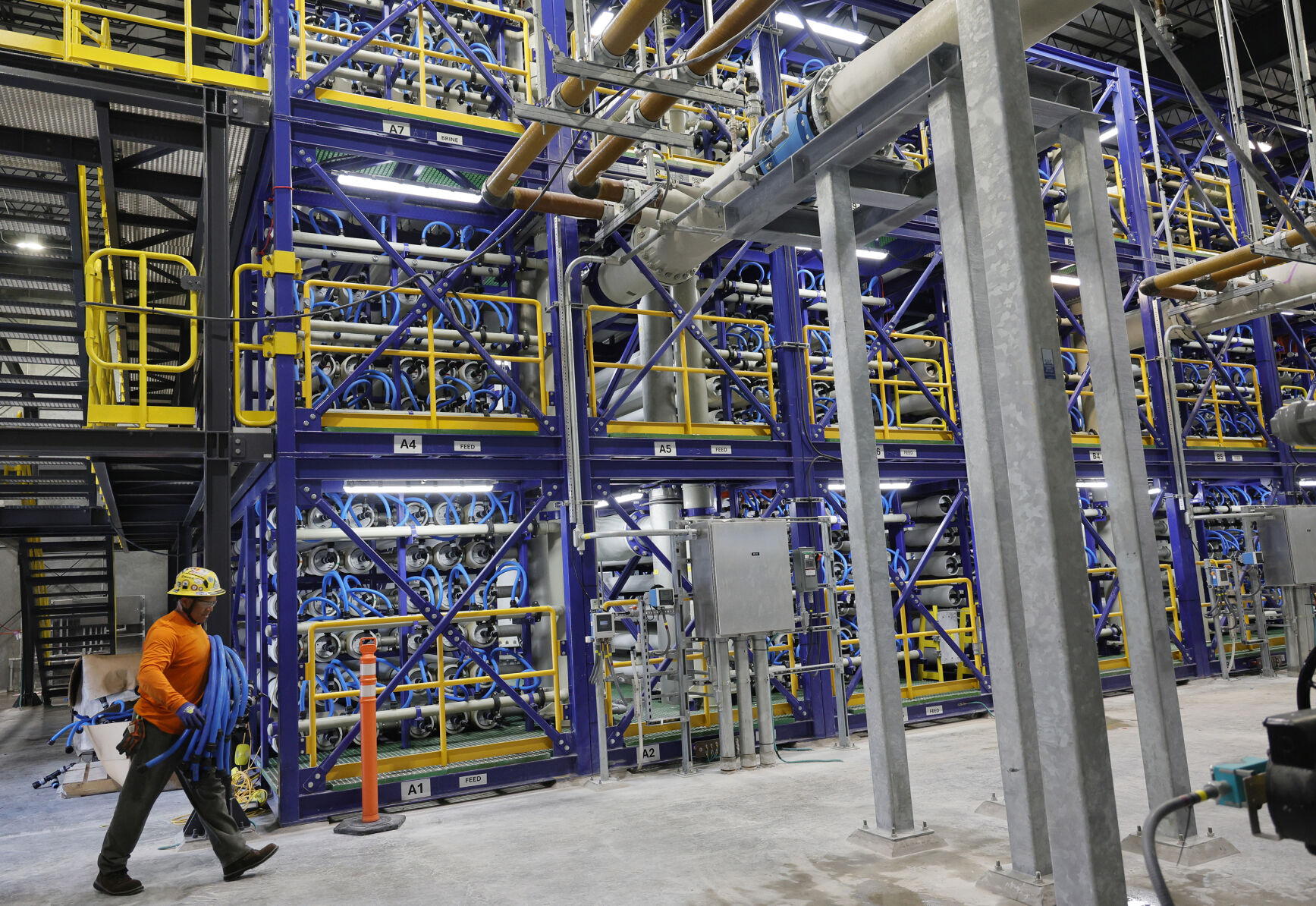 New Fort Lauderdale plant will turn yellow drinking water clear. But experts say old pipes may discolor it again
