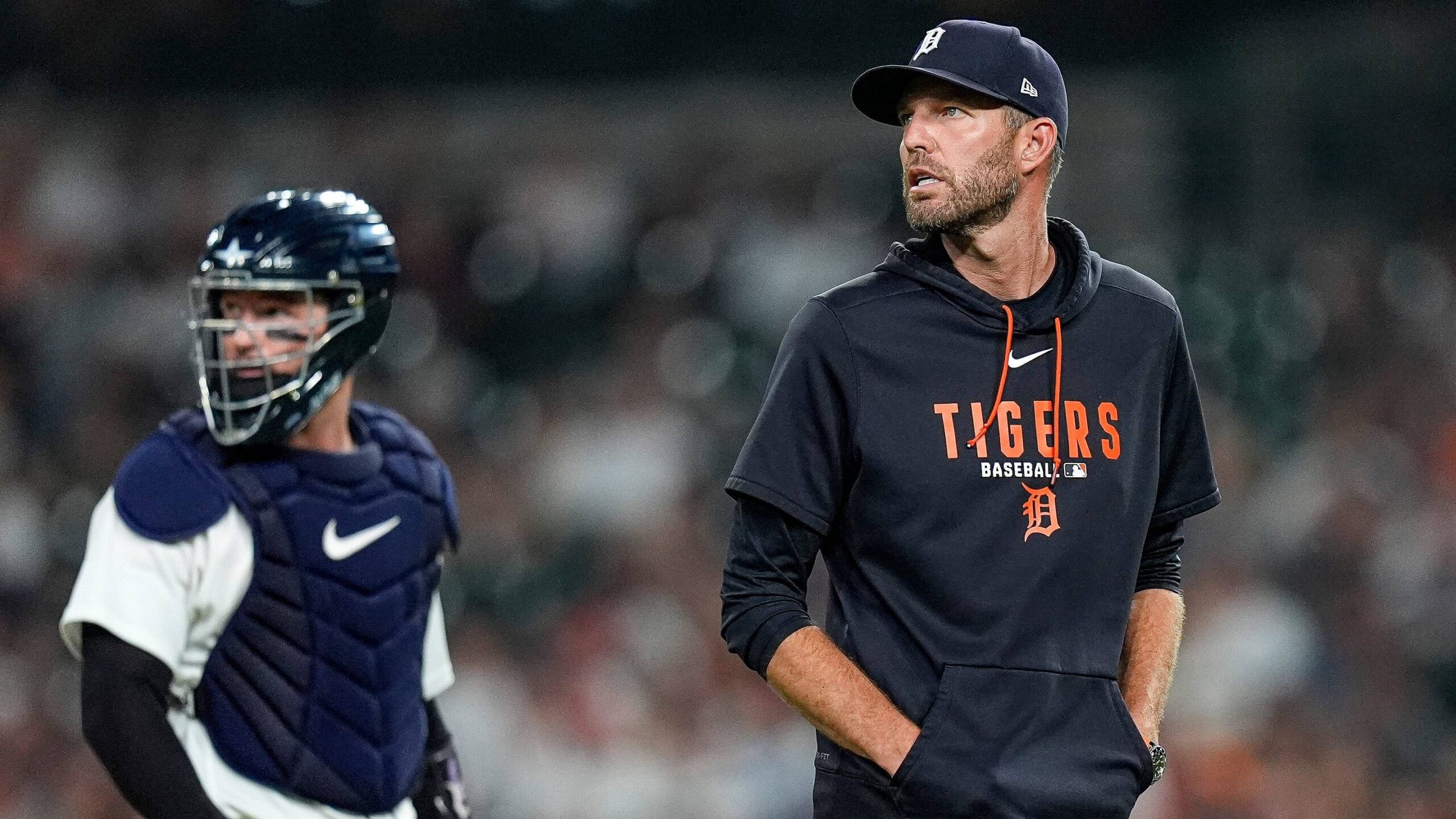 Detroit Tigers pitching coach Chris Fetter (41) walks off the field after a mound visit.